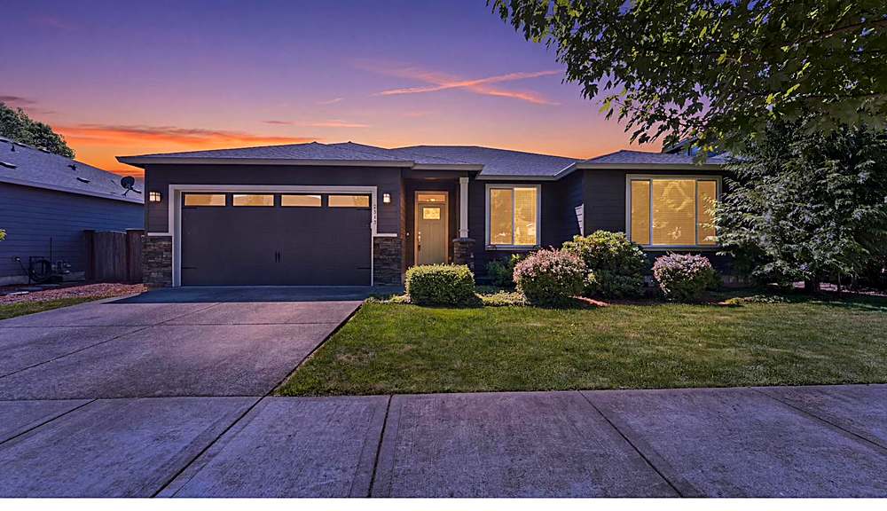 Twilight exterior of 7510 NE 176th Avenue, a single-level ranch home in Vancouver, WA