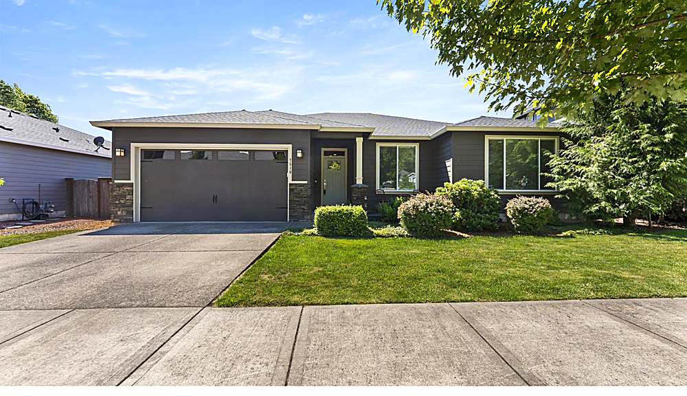 Front exterior and entry of the single-level ranch home