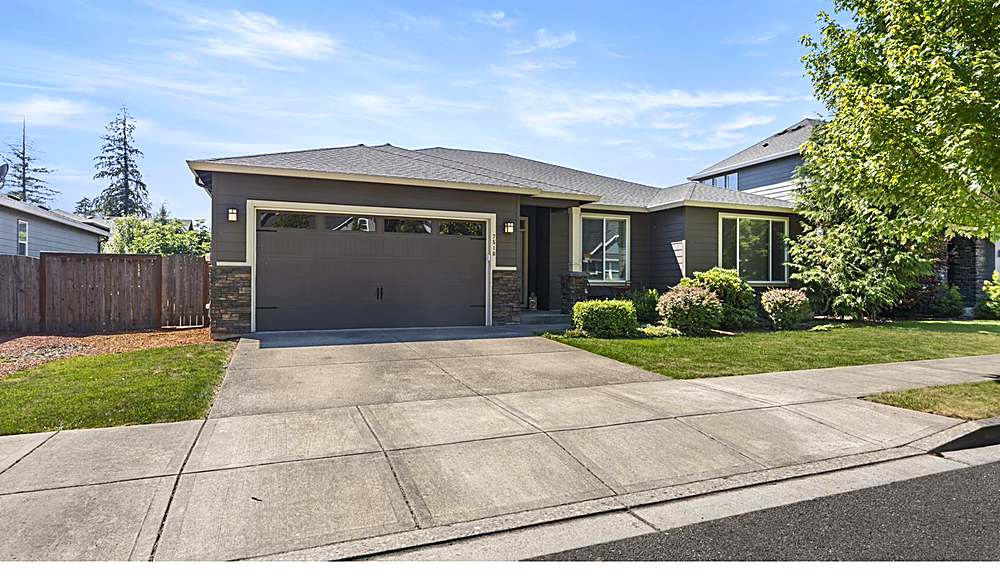 Front exterior and entry of the single-level ranch home