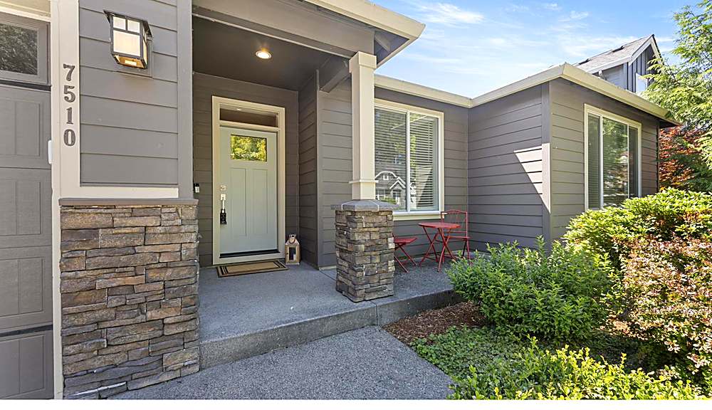 Front exterior and entry of the single-level ranch home