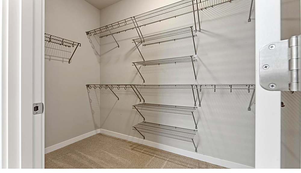 Primary bath with double sinks and walk-in shower